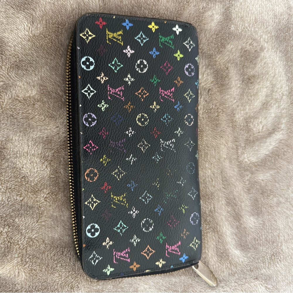 Louis Vuitton women’s Takashi Murakami Zippy Wallet multi color date code CA1175